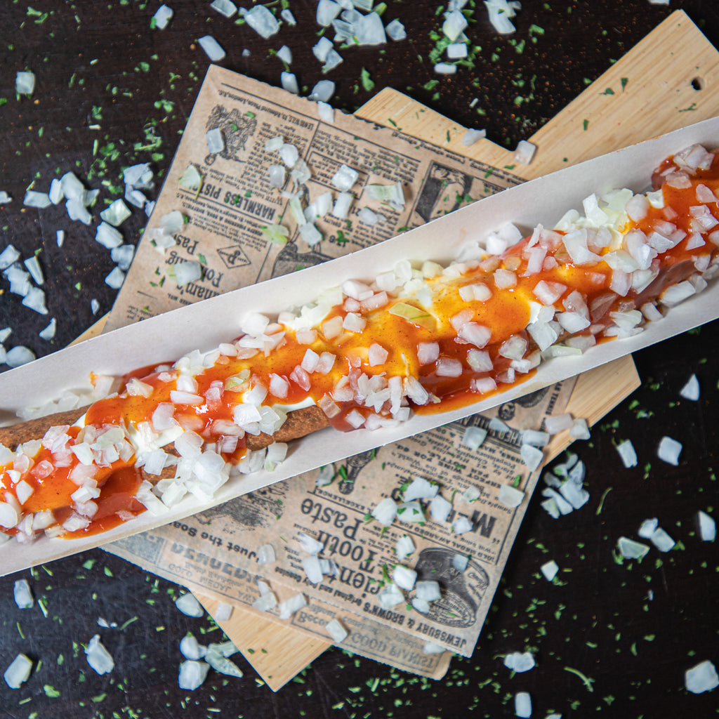 Curryworst XXL met topping – frituur Tipzakske
