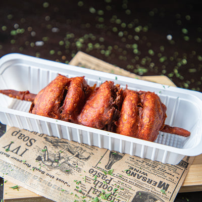 Grizzly snack met ui van frituur Tipzakske